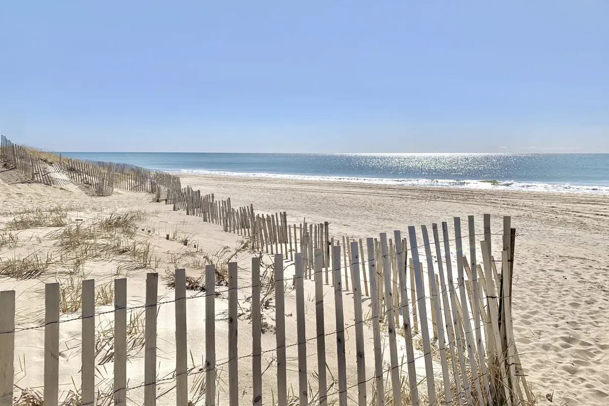 Fenced dunes leading to an Atlantic beach on the South Fork of Long Island (a shoreline view, not Round Dune itself)